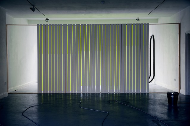 Dummy Object: version 3 <br/>2.4m h x 6.05m w x 8cm d<br/>timber, plywood, fluorescent fabric, Angus Hughes Gallery, London <br/>